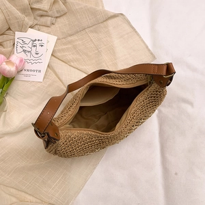 Handmade woven straw shoulder bag with leather strap and large capacity for beach holidays