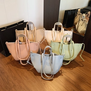 Chic commuter tote bags in pastel colors with lychee texture and dual strap design