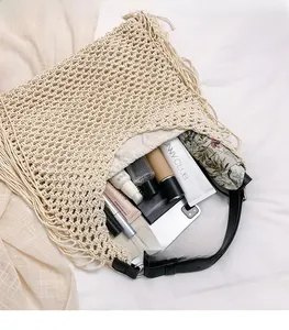 Macro view of beige crochet tote bag showing spacious interior with daily essentials