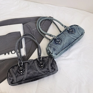 Retro washed denim cylinder shoulder bags in black and light blue on white fabric
