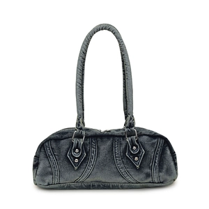 Retro washed denim baguette shoulder bag with silver rivets and street style aesthetic