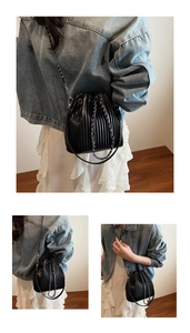 Detail of black pleated bucket bag with silver chain strap shown in collage view