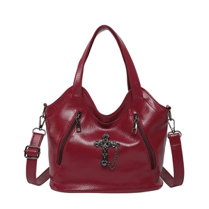 Dark red gothic crossbody bag with metallic cross pendant and leather texture