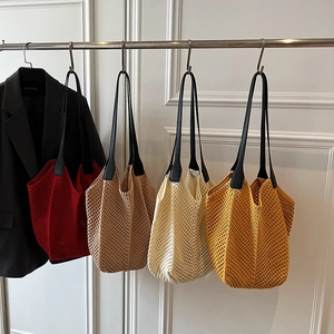 Handmade woven hollow knit tote bags in red, khaki, beige, and yellow with leather straps