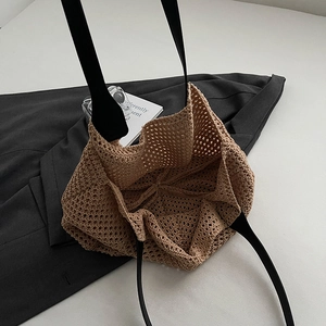 Chic mesh woven tote bag in khaki with black straps, minimalist casual shoulder bag style