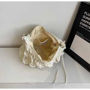 Large cream ruffled yoga tote bag with a zipper closure and spacious interior view