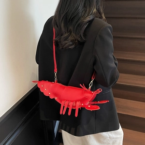 Creative red lobster-shaped leather crossbody bag with gold hardware and strap