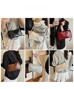 Detail view of rivet studded punk style underarm bags in six various fashion colors