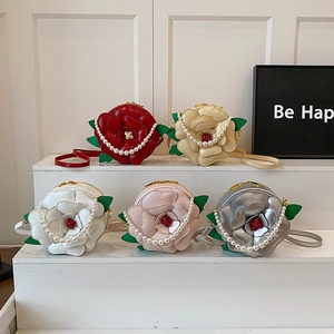 Floral round evening bag with pearl strap and 3D rose petals in multiple colors