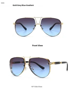Detail of gold metal aviator sunglasses with grey blue gradient lenses and double bridge