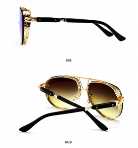 Detail view of gold metal sunglasses with side shield design and black cross temple arms