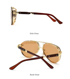 Macro detail of steampunk sunglasses with gold metal mesh side shields and floral reliefs