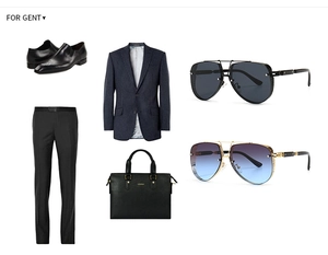 Flat lay of modern aviator sunglasses with professional business suit and leather bag