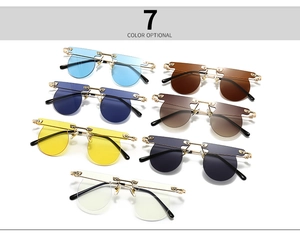 Flat lay view of retro round rimless sunglasses in seven optional vibrant frame colors