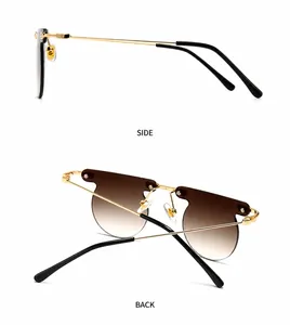 Detail view showing side and back of rimless gradient sunglasses with gold metal temples