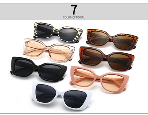 Collection of seven colorful vintage cat-eye sunglasses with modern retro thick frames