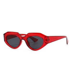 Modern red transparent square sunglasses with grey lenses and geometric metal inlay