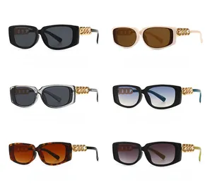 Six colors of square sunglasses featuring bold gold chain temples in a matrix display