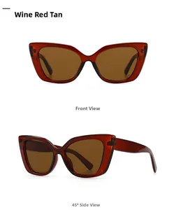 Detail view of wine red cat eye sunglasses with brown lenses and front 45 degree display