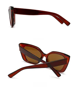 Detail view of tortoiseshell cat eye sunglasses showing side and back angles
