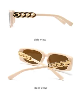 Detail view of stylish beige rectangular sunglasses featuring bold gold chain link temples
