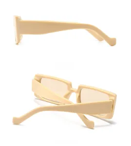 Detailed side and back view of retro rectangular sunglasses with wide cream frames