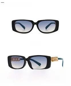 Front and 45-degree side views of black square sunglasses with gold chain temples