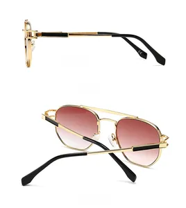 Side and back view of aviator metal sunglasses with gold frames and gradient lenses