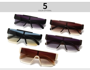 Detail view of oversized flat top sunglasses in five vintage gradient color options