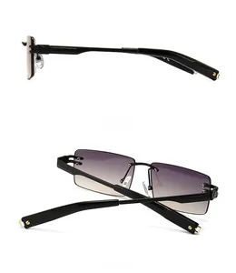 Detailed side and back view of rimless rectangular sunglasses with gradient lenses