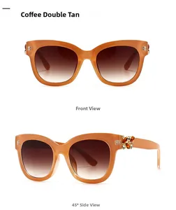 Détail de lunettes de soleil œil-de-chat ambre avec branches ornées de strass étincelants