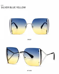 Détail de lunettes de soleil carrées oversize avec verres dégradés et branches en métal évidé