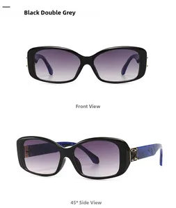 Detail of square black sunglasses with blue marble temples and golden metal hinge