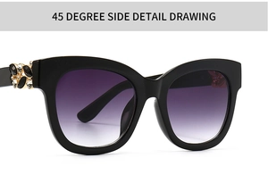 Détails de motifs de feuilles en strass sur la branche de lunettes de soleil noires carrées