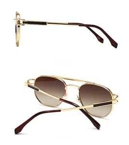 Side and back view of gold metal aviator sunglasses with brown gradient lenses and CE mark