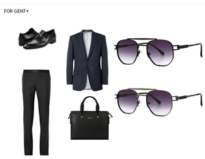 Flat lay of men's business fashion set with navy blazer, leather shoes and briefcase