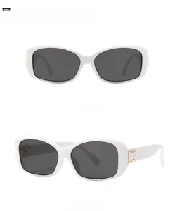Detailed front and 45-degree side view of white rectangular sunglasses with gold metal accents