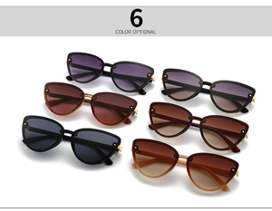 Flat lay of modern cat-eye sunglasses in six stylish color options with metallic accents