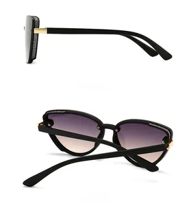 Cat eye sunglasses featuring purple gradient lenses and sparkling glitter frame accents