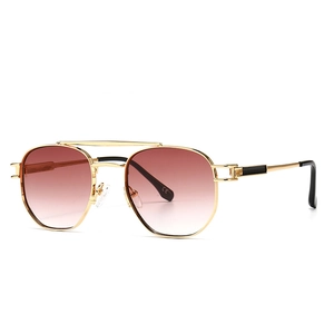 Classic gold metal aviator sunglasses with brown gradient lenses and double bridge design