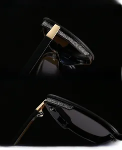 Detail of cat eye sunglasses with glitter frames and UV protection metal hinges