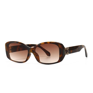 Modern retro square tortoiseshell sunglasses with brown gradient lenses and gold accents