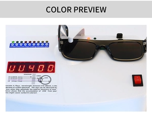 UV400 protection test showing black retro sunglasses on a professional UV testing device