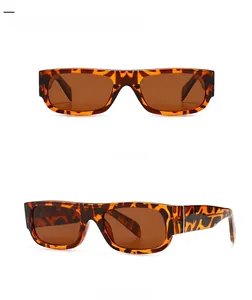 Front and 45-degree side views of leopard print rectangle sunglasses with tan lenses