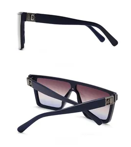 Detail of navy blue square frame sunglasses with gradient lenses and silver G metal hinge