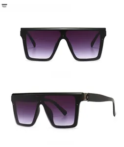 Front and 45-degree side view of oversized black frames with purple gradient lenses