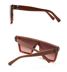 Side and back view of brown square oversized sunglasses with gold G hinge detail