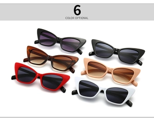 Flat lay of retro slim cat eye sunglasses available in six trendy fashion colors