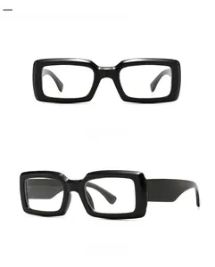 Close-up of black rectangular sunglasses showing front and 45-degree side views