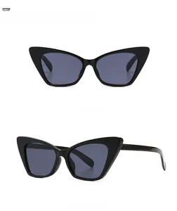 Detailed front and side views of vintage black cat-eye sunglasses with grey lenses